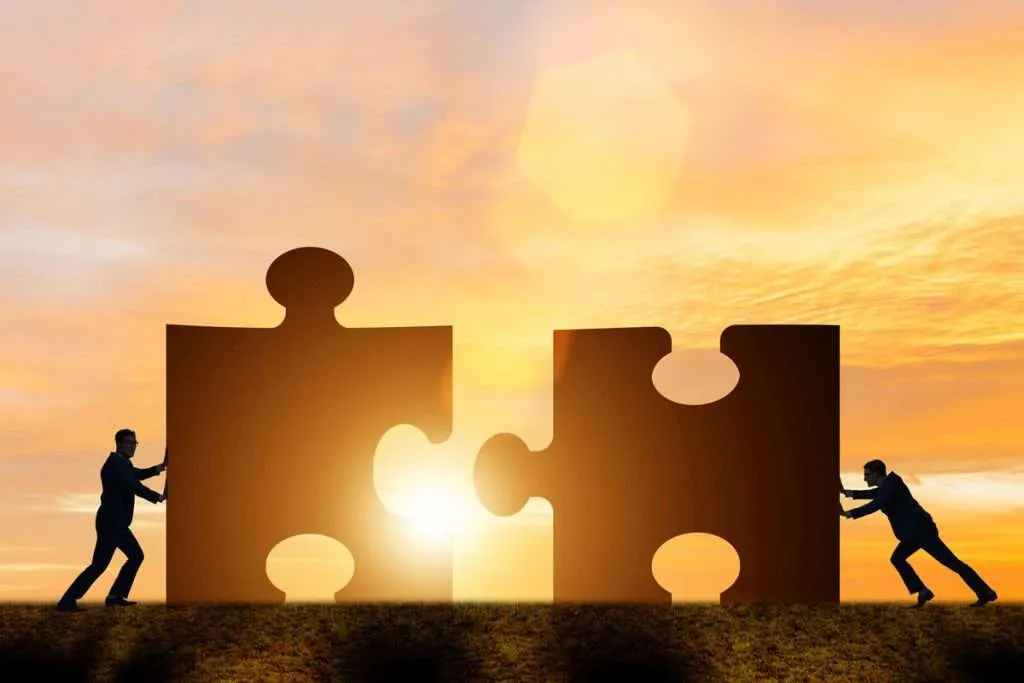 Business Concept Teamwork With Jigsaw Puzzle